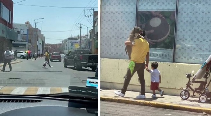 Il se promène avec son chien dans les bras comme s’il était un enfant alors que son jeune fils marche